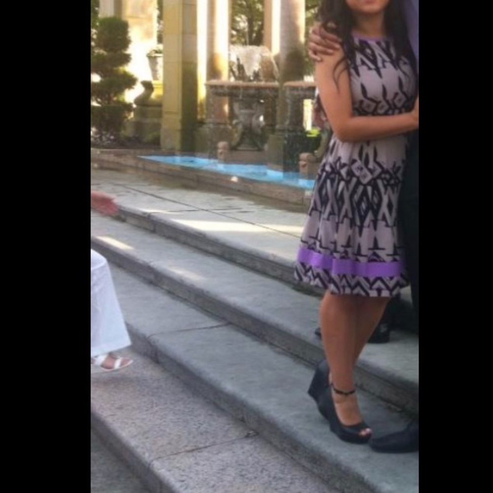 Beautiful pleated dress.